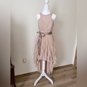 Formal dress shimmer lace overlay with a layered tooled bottom.